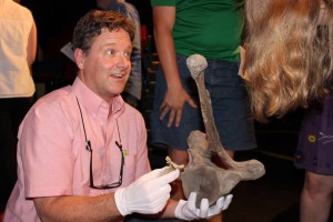 Dr. Jones with mastodon bones. Photo by Jake Williams